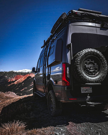 Owl Vans Sprinter (2019+) Aluminum Expedition Tire Carrier (on the mountain) - Campervan HQ